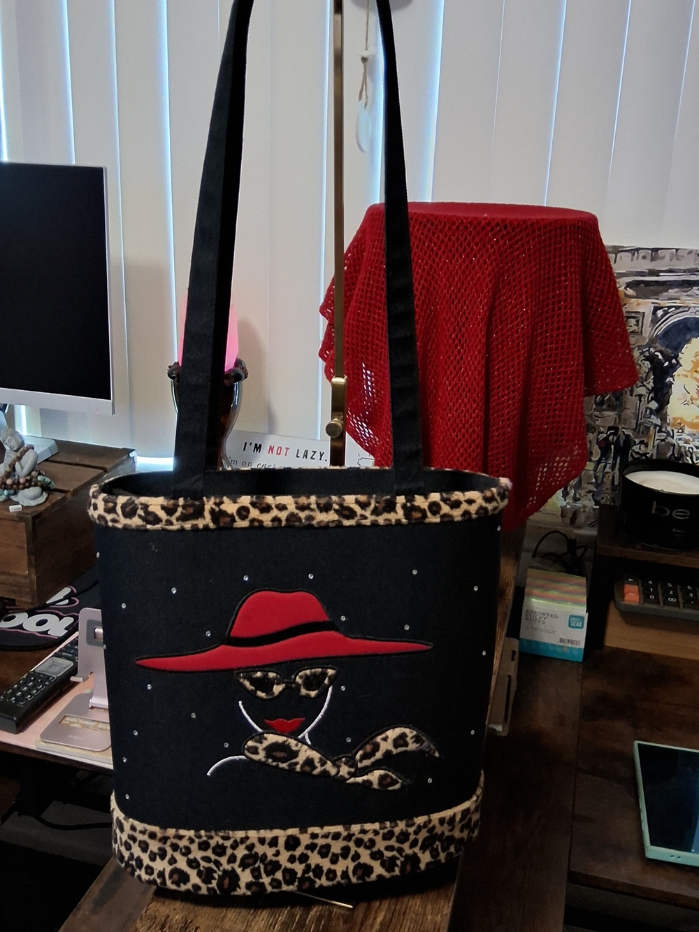 Black Structured Tote Bag with Red Hat Accent and Leopard Trim